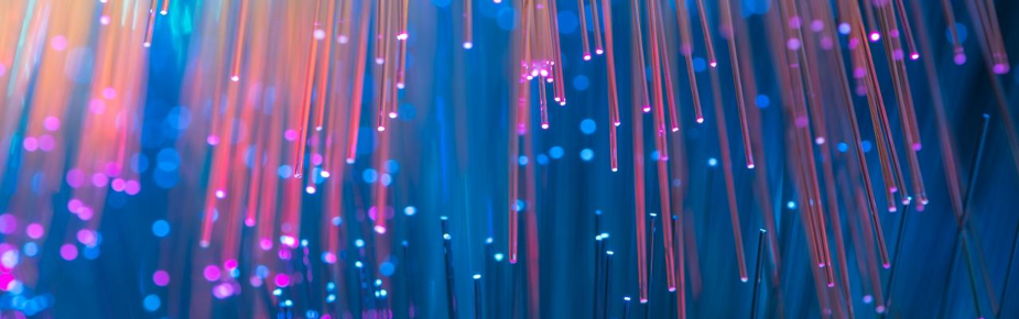 Optical fibres dinamic flying from deep on technology background